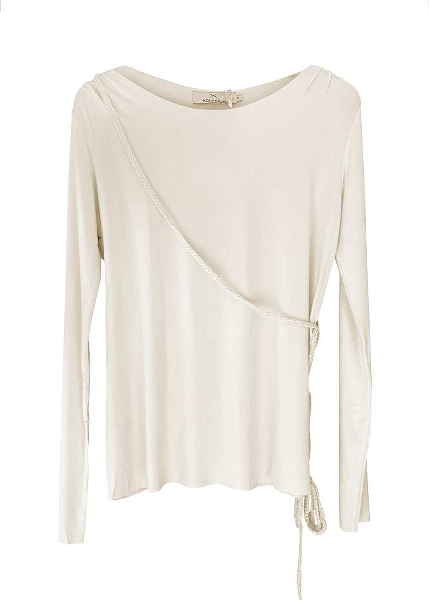 The softest top ever, perfect for layering and daily life usage during colder seasons. It features a design with non – removable strings.