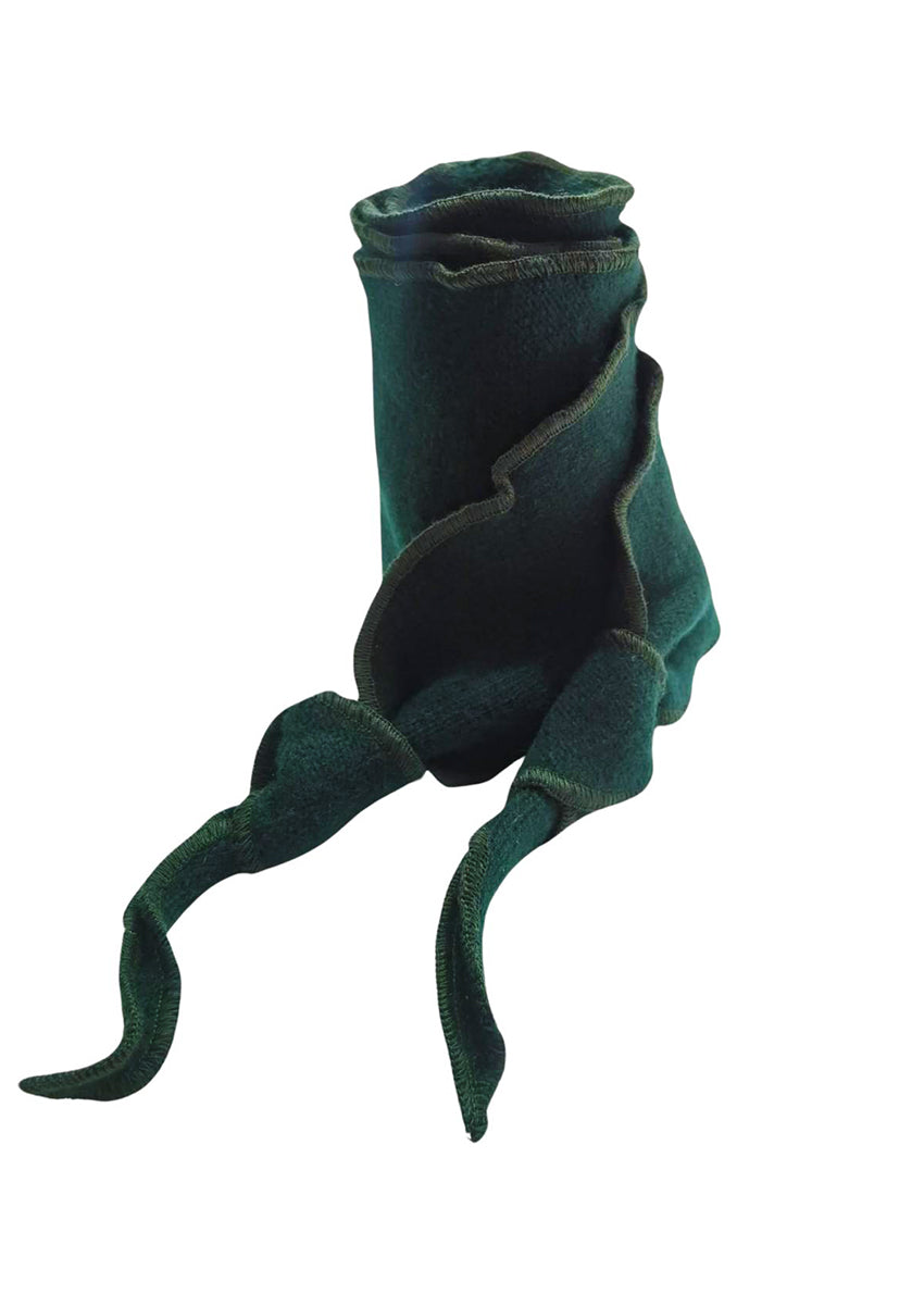 Experience the graceful undulation of our undulated scarves, meticulously crafted from 100% Pure Merino Wool.