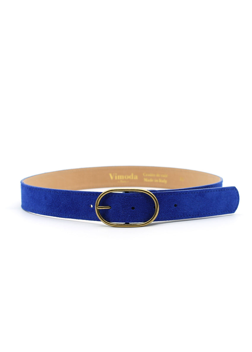 A royal blue belt with a gold buckle, featuring a dual-sided design with one side in suede blue leather and the other in smooth beige leather.