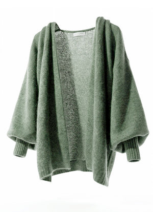 Green sweater on a white background
