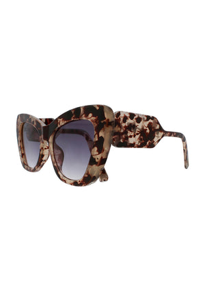 These cat-eye brown sunglasses offer both fashion-forward design and practical UV400 protection, ensuring your eyes stay shielded from harmful sun rays while you make a bold statement. Perfect accessory for any occasion.
