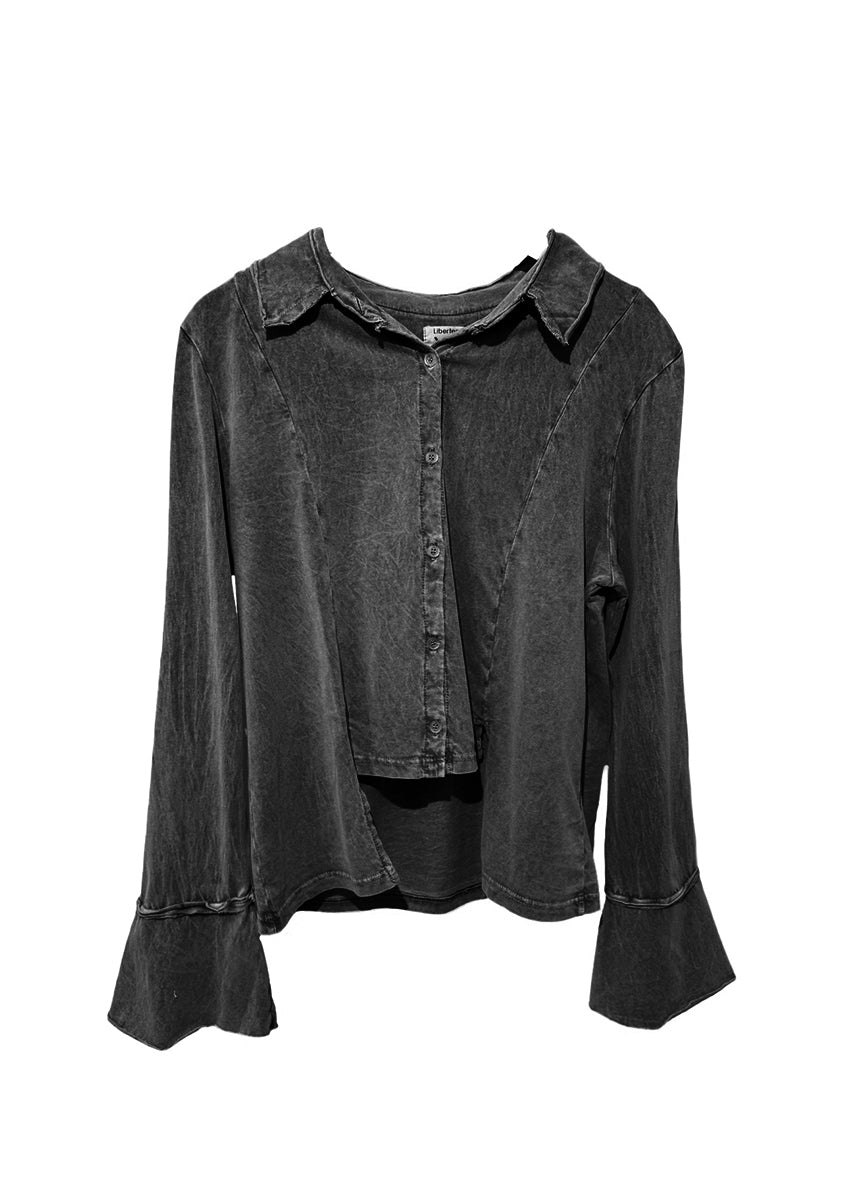 Black shirt with bell sleeves on a white background