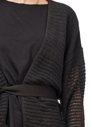 Knitted cardigan made from a high-quality blend of fibres,  offering you the perfect balance of comfort, durability and style.
