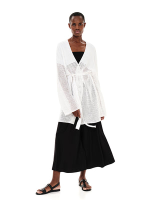  Knitted cardigan made from a high-quality blend of fibres,  offering you the perfect balance of comfort, durability and style.
