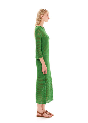 Maxi green dress with a loose knitting in a straight fit.It has long bell sleeves and a slit on the side.Creates an airy silhouette for your carefree summer strolls.