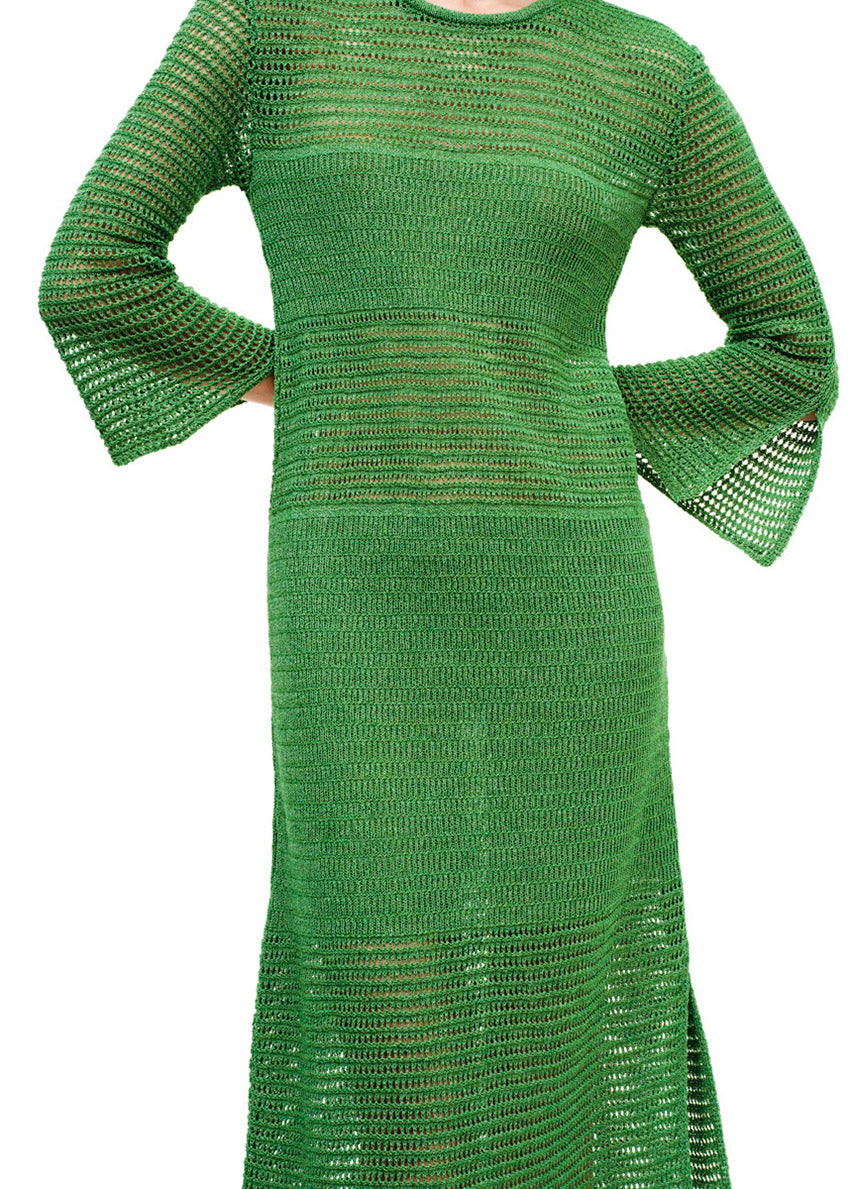 Maxi green dress with a loose knitting in a straight fit.It has long bell sleeves and a slit on the side.Creates an airy silhouette for your carefree summer strolls.
