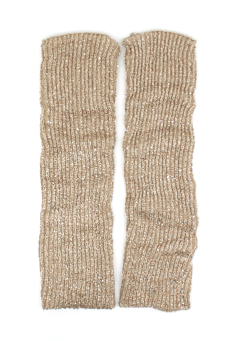 Ribbed knit leg warmers with all-over sequins. Wear over leggings, tights, or bare legs. Soft, stretchy, and warm. One size fits most. Perfect for festive outfits, dance nights, or elevating everyday style