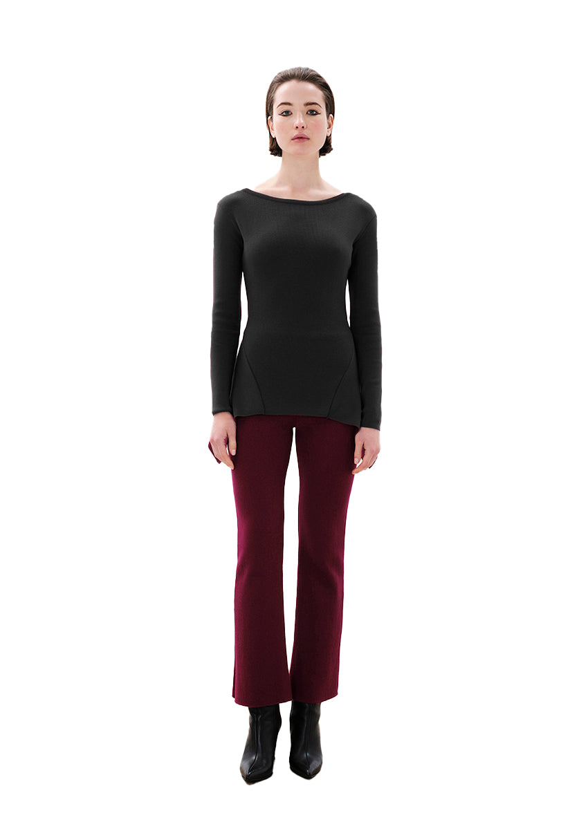 Unique asymmetrical modal blend top—soft, stretchy, with boat neckline and long sleeves. Perfect for chic, feminine winter outfits.
