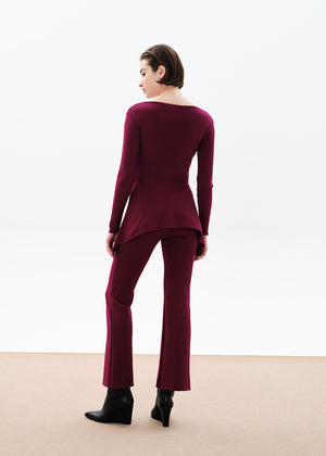 Unique asymmetrical modal blend top—soft, stretchy, with boat neckline and long sleeves. Perfect for chic, feminine winter outfits.