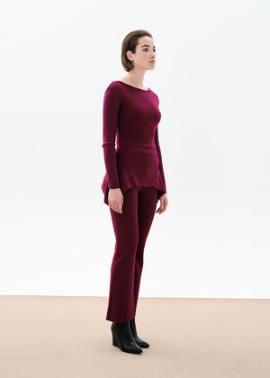 Unique asymmetrical modal blend top—soft, stretchy, with boat neckline and long sleeves. Perfect for chic, feminine winter outfits.