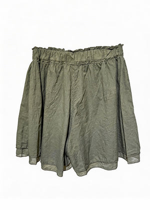 Green shorts on a white background