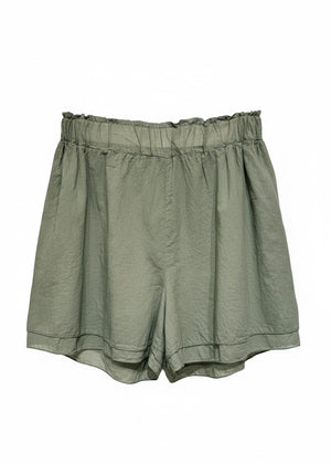 Green shorts on a white background