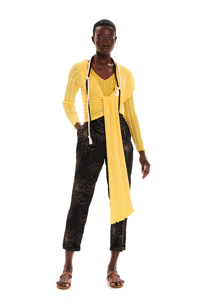 Introducing the Sleek Necklace, a joyful and original piece crafted from viscose rope. Made with love, this necklace adds a playful touch to any outfit, in any season. Its cute and funny design makes it a perfect accessory to express your unique style