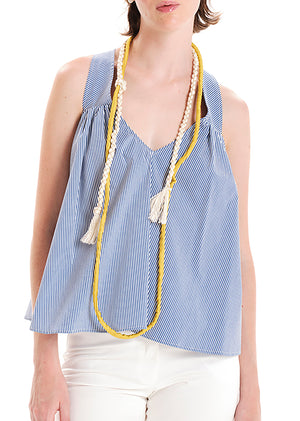 Introducing the Sleek Necklace, a joyful and original piece crafted from viscose rope. Made with love, this necklace adds a playful touch to any outfit, in any season. Its cute and funny design makes it a perfect accessory to express your unique style