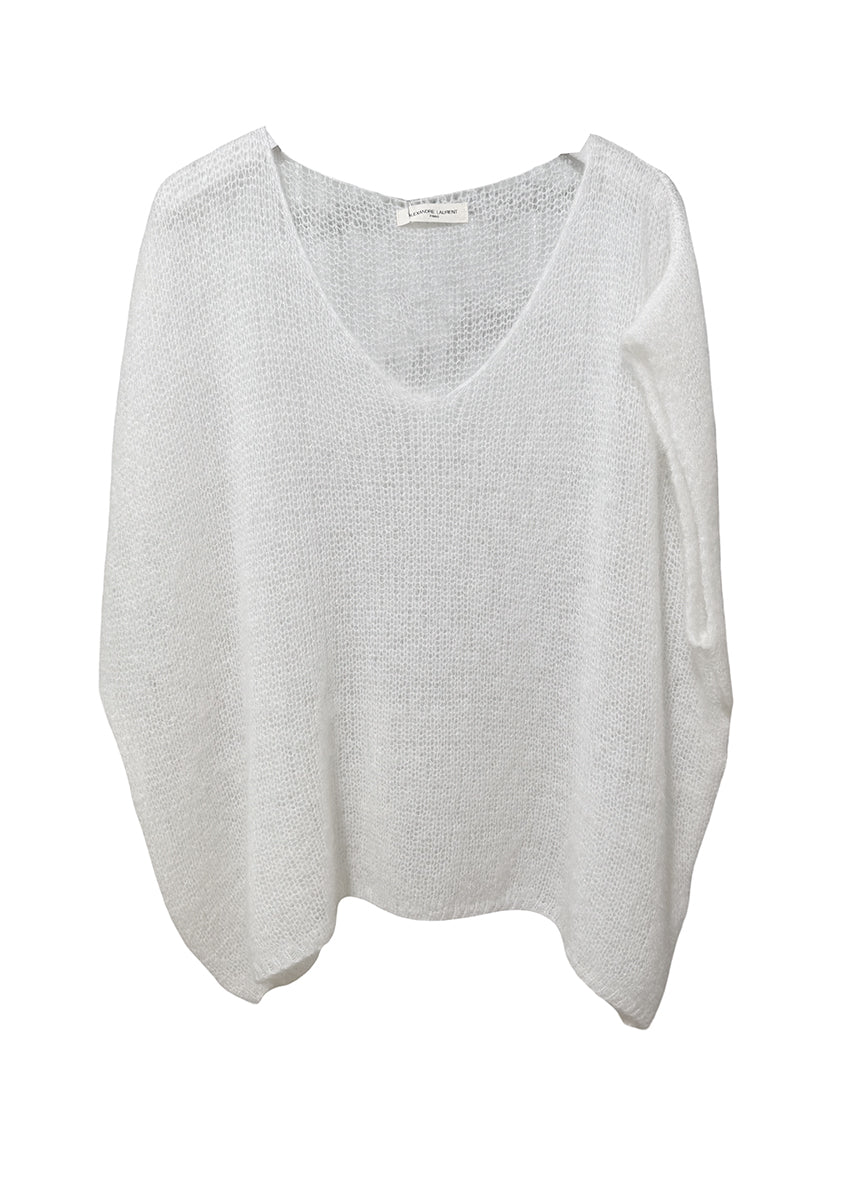 White knit top on a white background