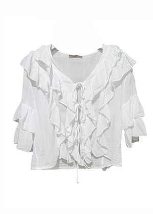 White blouse with ruffled details on a white background