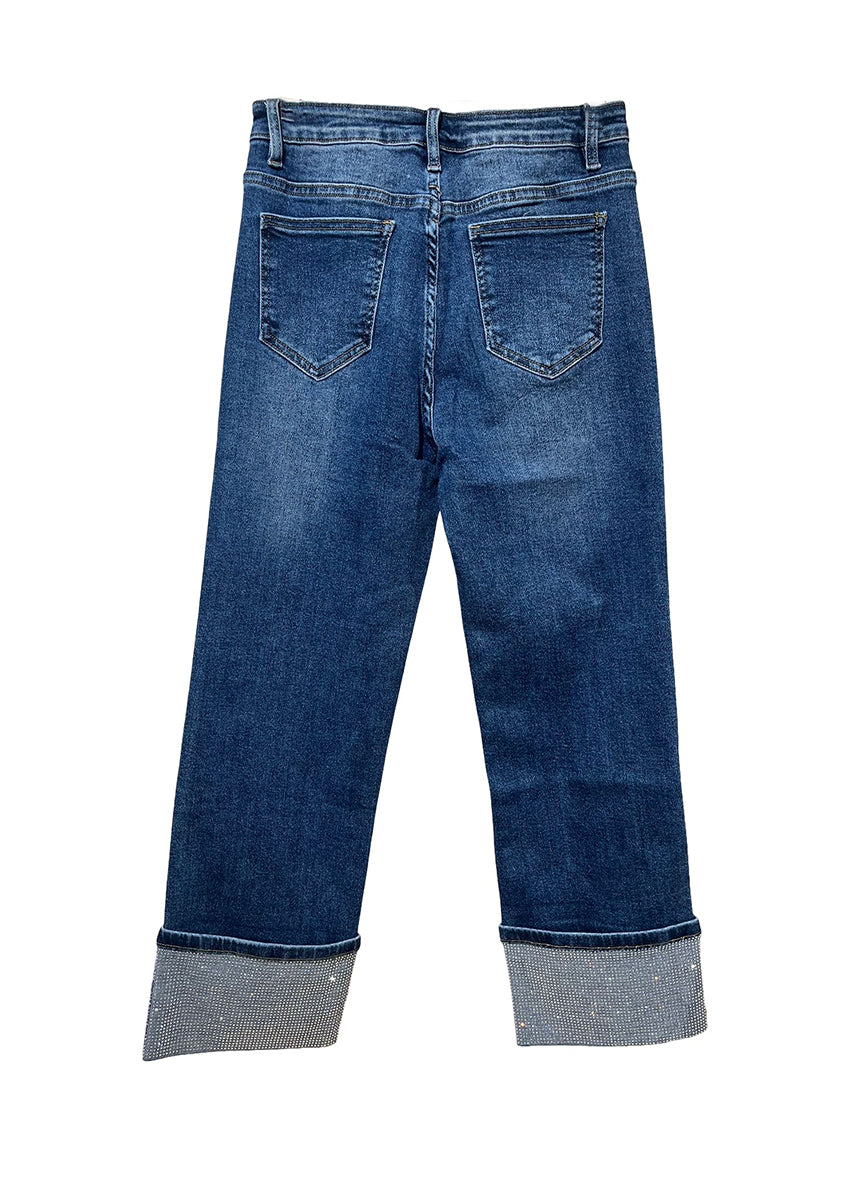 Blue jeans with sparkles  cuffs on a white background