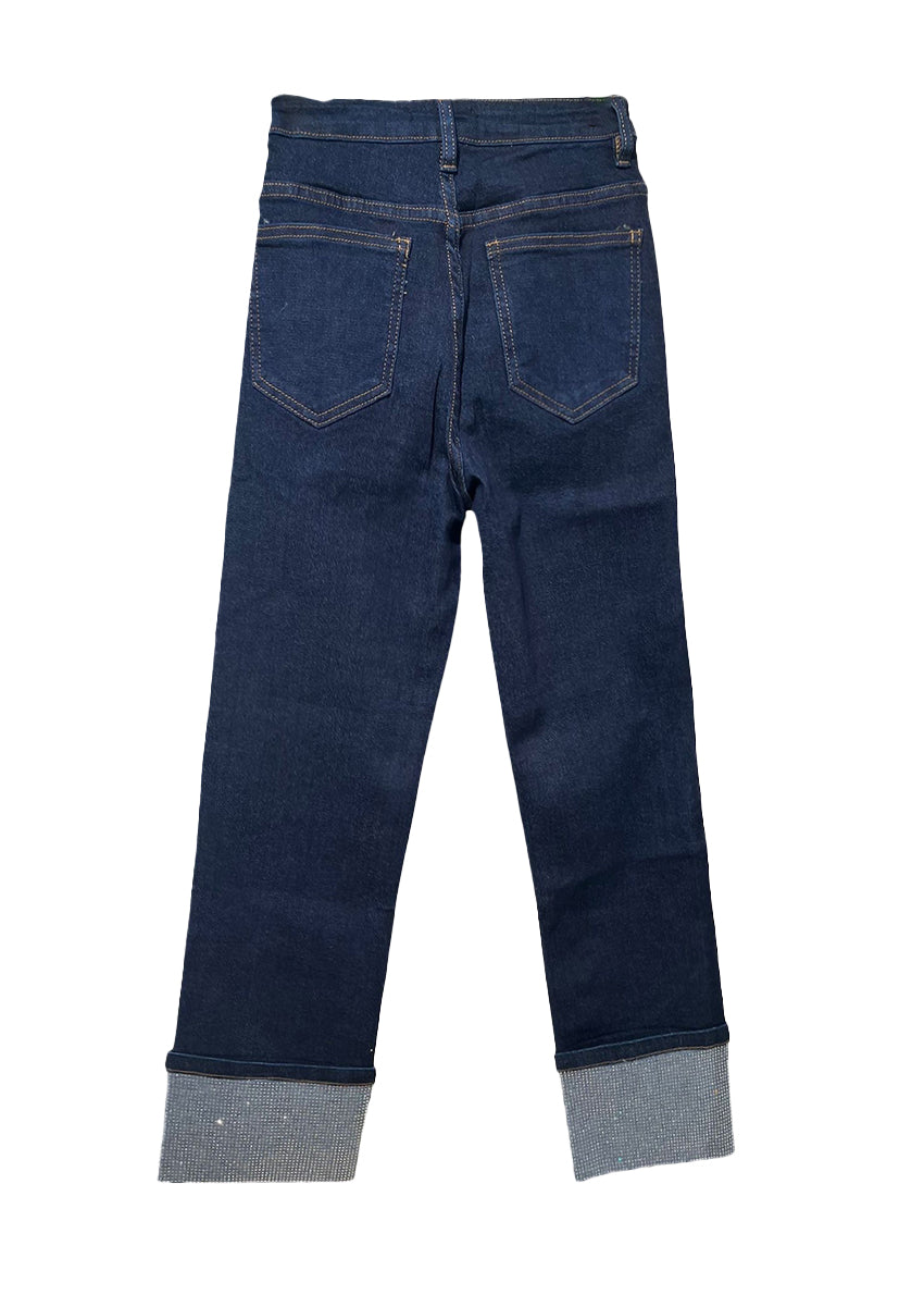 Dark blue jeans with sparkles cuffs on a white background
