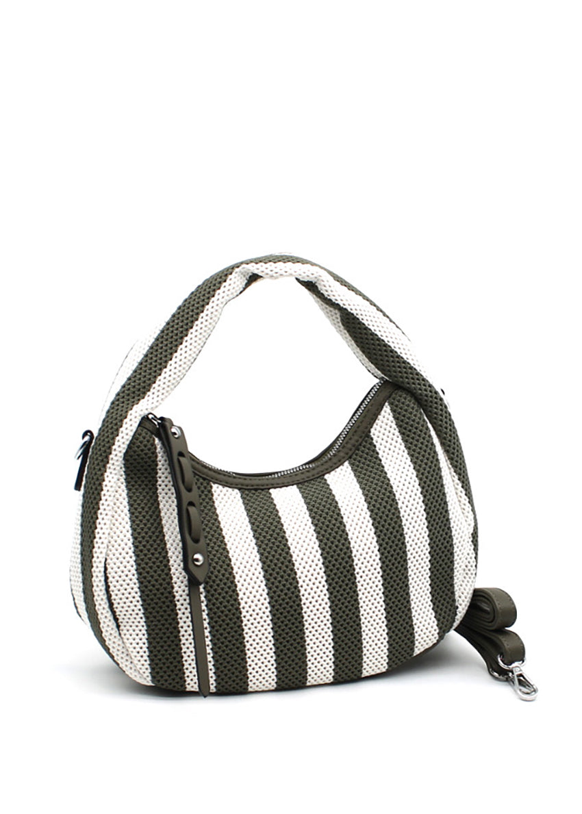 Person wearing a light gray shirt with a khaki and white striped bag over their shoulder.