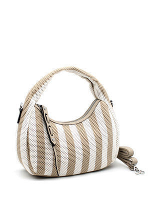 A handbag with a bold beige and white striped design, featuring a crescent shape and a detachable strap.
