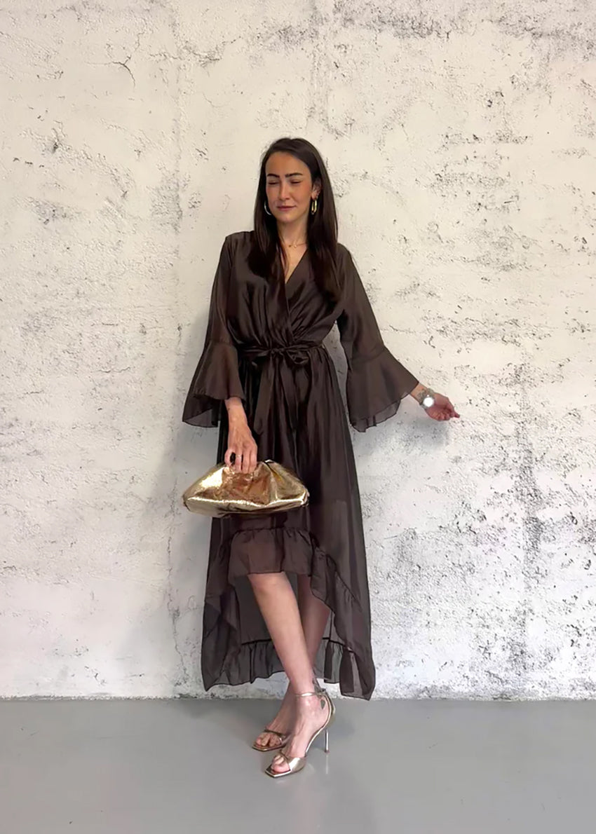 Brown dress with bell sleeves on a white background