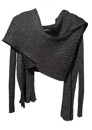 Versatile cardigan made of viscose and lurex yarn. It is a very special piece, designed exclusively by Kourbela and is a trademark for the brand. Suitable for glamorous evening appearances with a touch of shimmer.