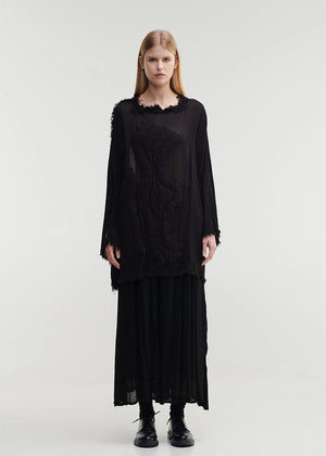 Step out in style with the TANTO trousers! These lightweight, breezy wonders feature a comfy elastic waist and side pockets for added convenience. The playful texture, recycled viscose has a slight soft shine over the surface and the softest texture on the skin.