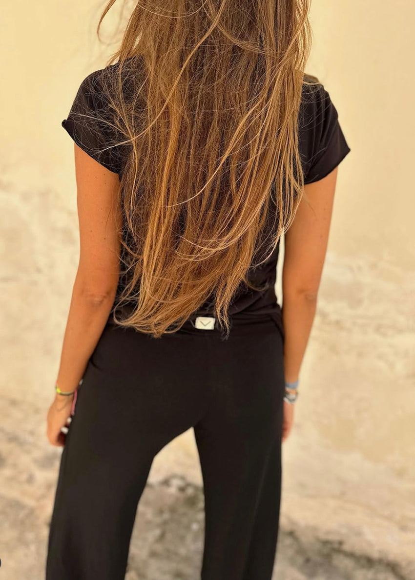 Black t-shirt on a white background