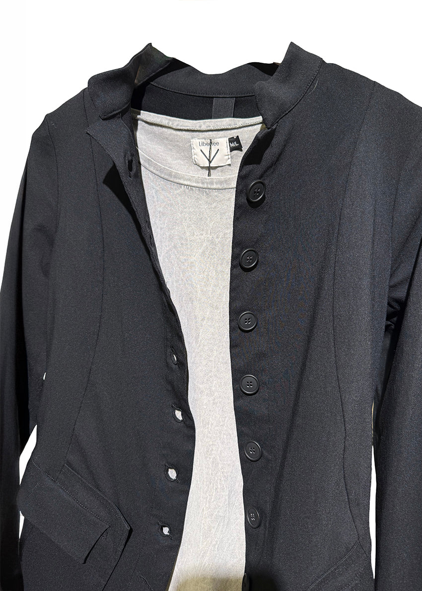 Black button-up shirt with a gray sweater underneath on a white background