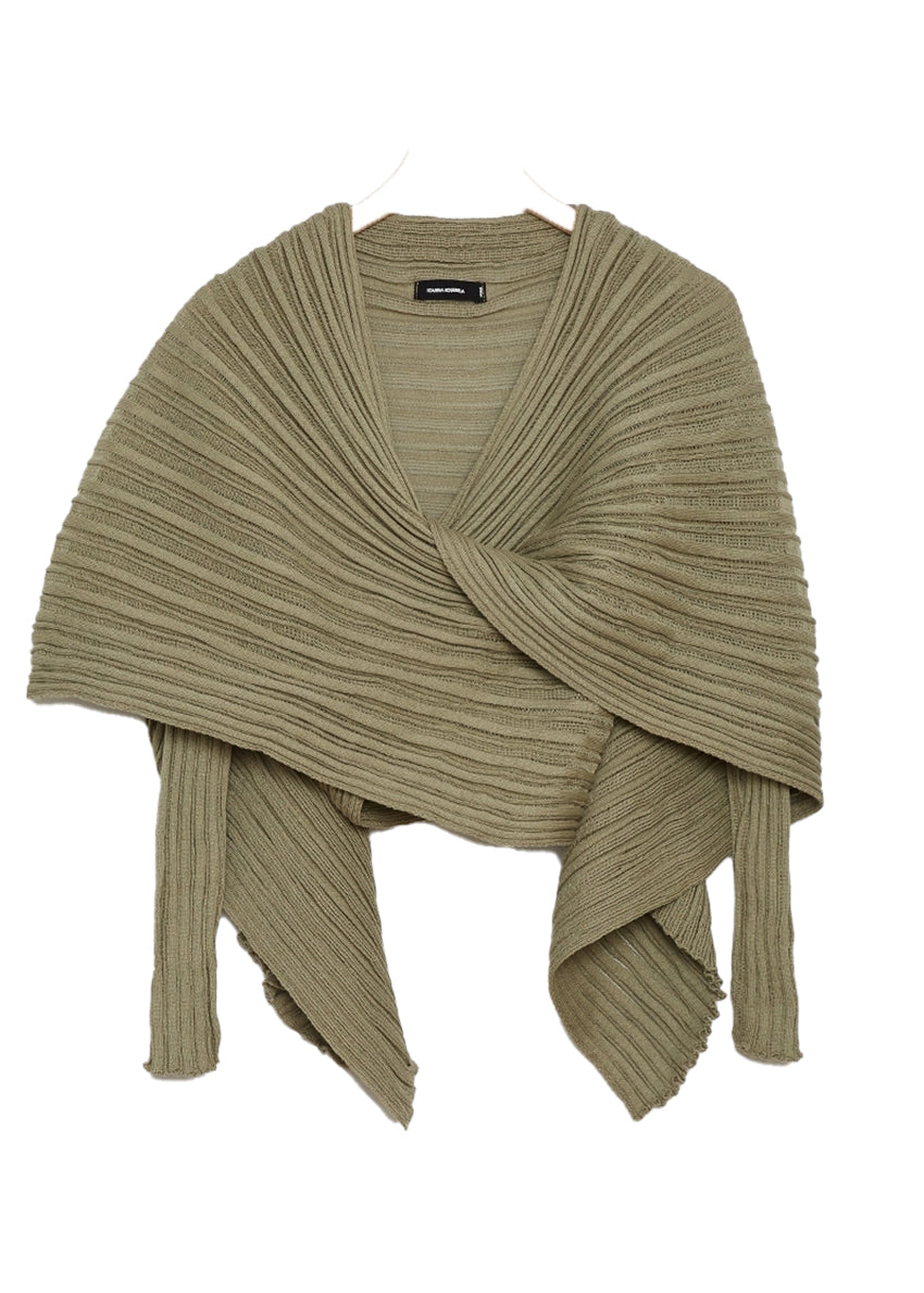 Perforated versatile knit cardigan with asymmetrical panels at the front. Made from 100% Greek cotton. The thick horizontal archetypal knitting allows for a loose flow and a beautiful fit. A very special piece, drawing inspiration from pleats