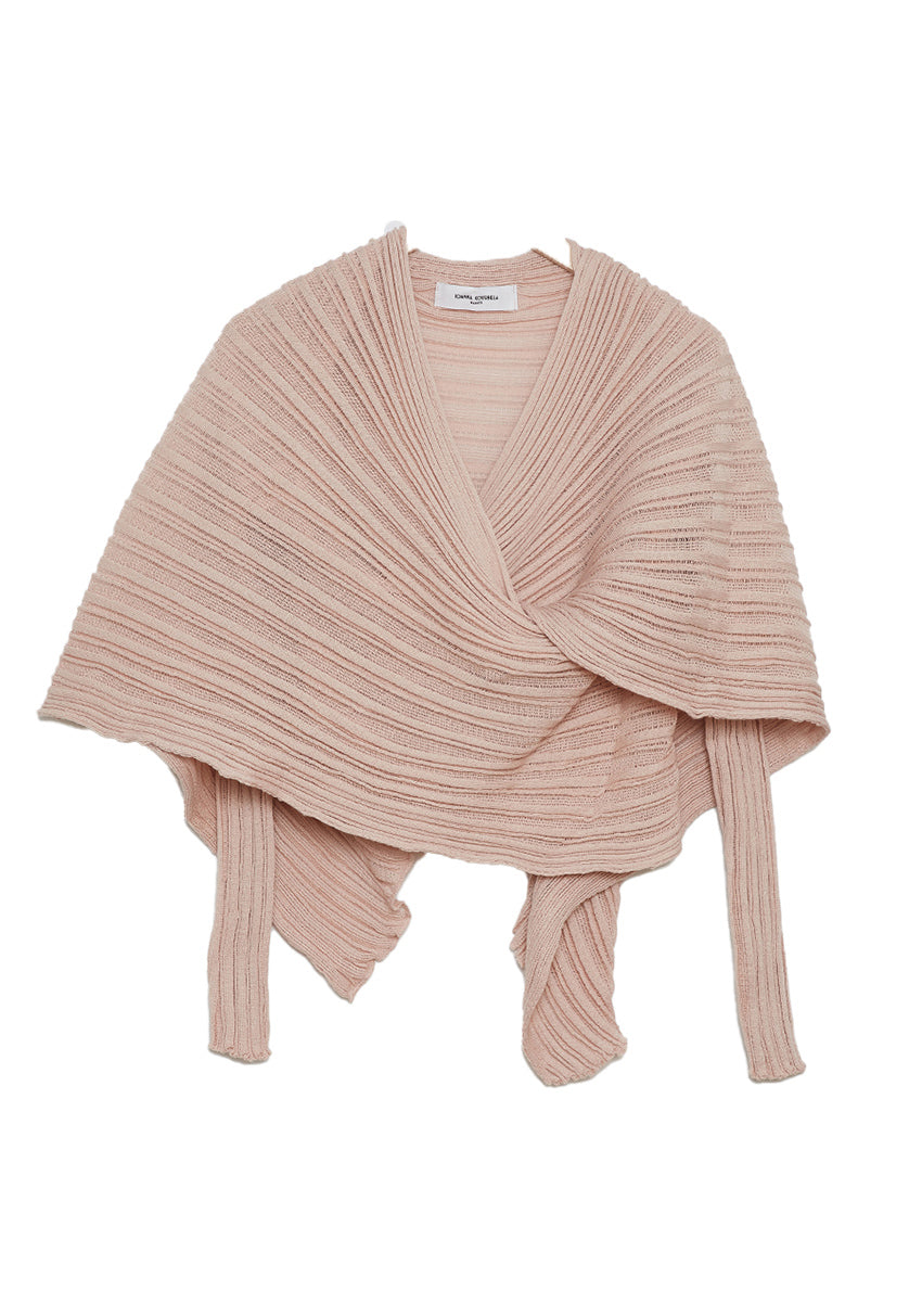 Perforated versatile knit cardigan with asymmetrical panels at the front. Made from 100% Greek cotton. The thick horizontal archetypal knitting allows for a loose flow and a beautiful fit. A very special piece, drawing inspiration from pleats