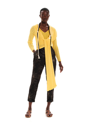 Perforated versatile knit cardigan with asymmetrical panels at the front. Made from 100% Greek cotton. The thick horizontal archetypal knitting allows for a loose flow and a beautiful fit. A very special piece, drawing inspiration from pleats