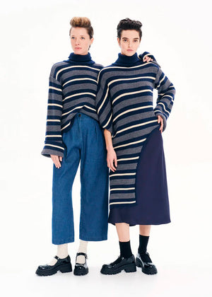 Knit long - sleeved turtleneck top.Knit long - sleeved top with stripes made of a blend of two different fabrics in a comfortable fit that features bell sleeves and a turtleneck neckline.