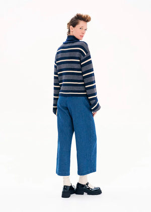 Knit long - sleeved turtleneck top.Knit long - sleeved top with stripes made of a blend of two different fabrics in a comfortable fit that features bell sleeves and a turtleneck neckline.