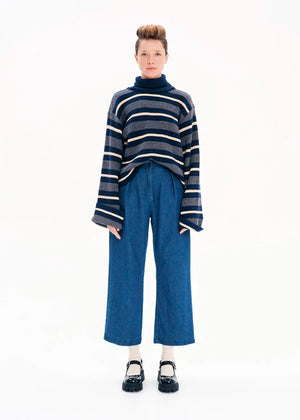Knit long - sleeved turtleneck top.Knit long - sleeved top with stripes made of a blend of two different fabrics in a comfortable fit that features bell sleeves and a turtleneck neckline.