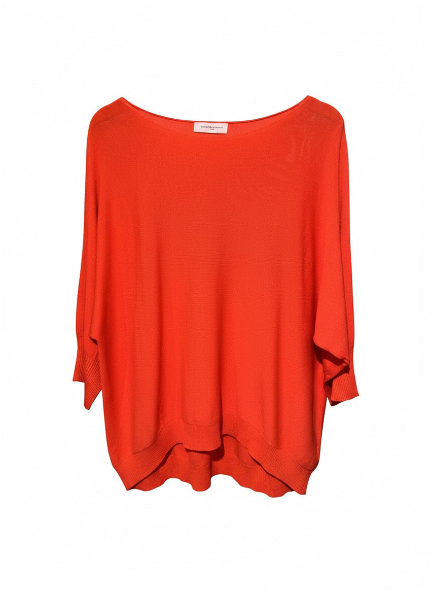 Orange sweater on a white background