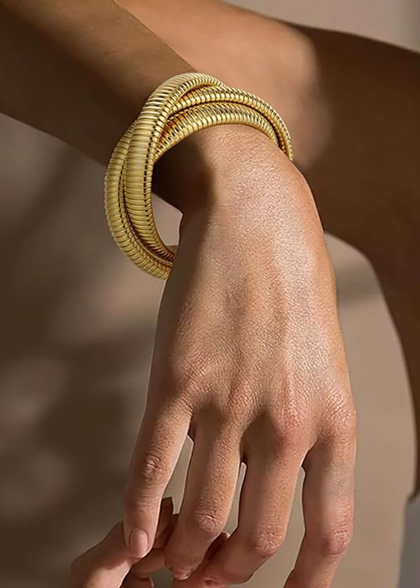 Simple design is a timeless classic. With no unnecessary embellishments, the layered surface and lustrous finish of the bangle bracelets are enough to display its minimalist uniqueness.