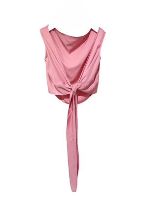 Pink sleeveless top with a tie detail on a white background