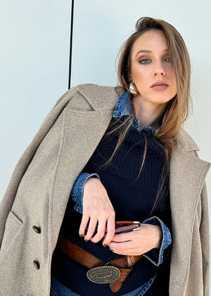 Woman wearing a beige wool coat 