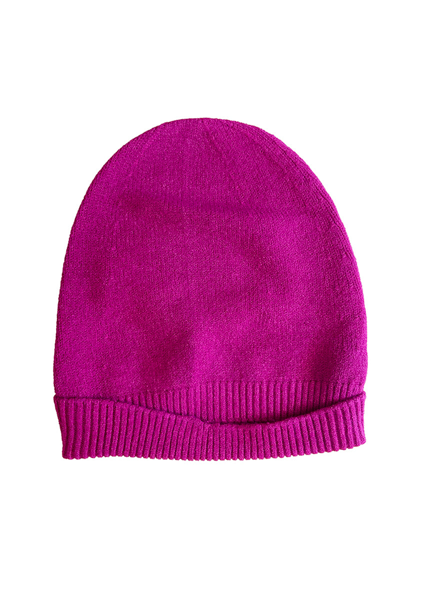 got pink warm beanie on a white background