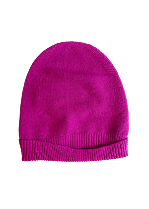 got pink warm beanie on a white background