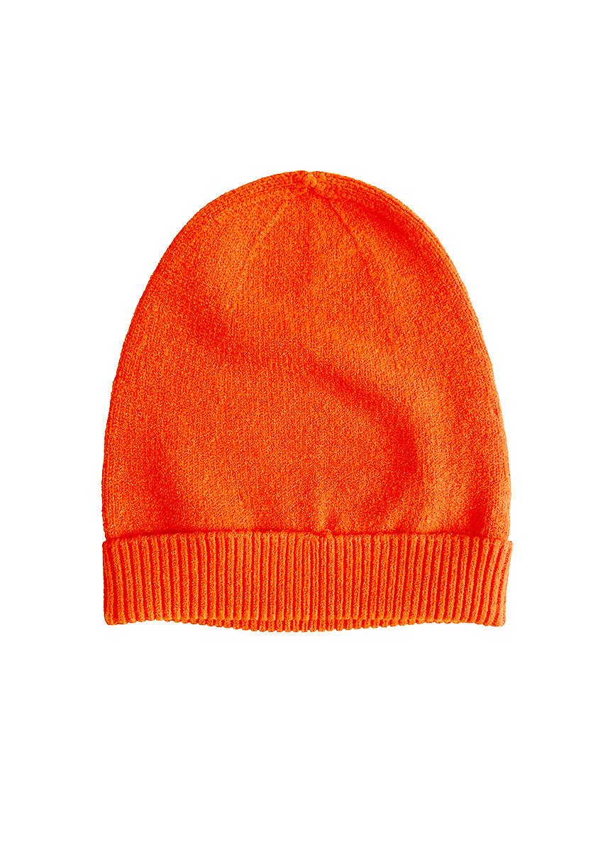 Orange warm beanie on a white background