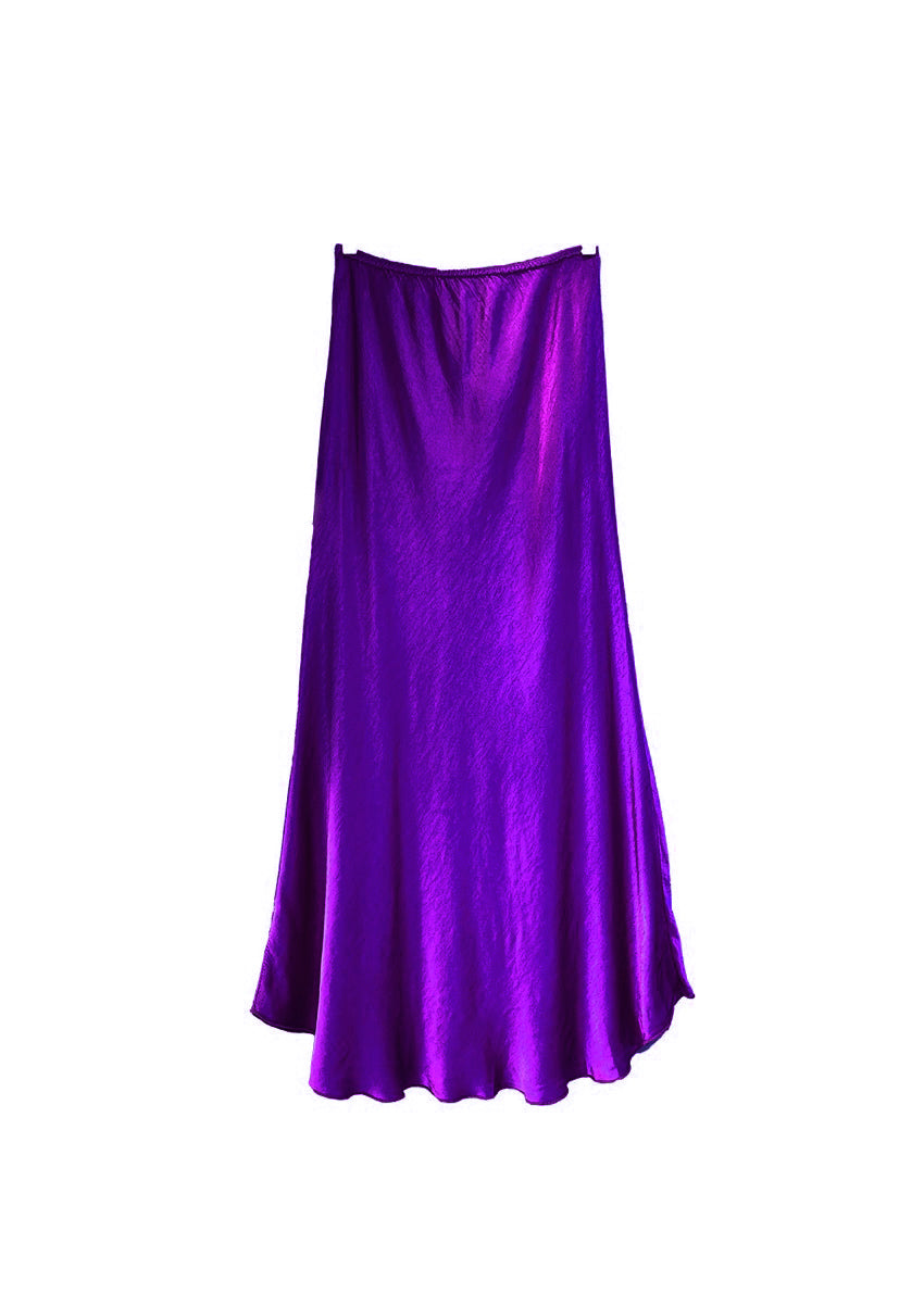 A purple satin midi-length skirt with a high-rise waist and a flaring hem.