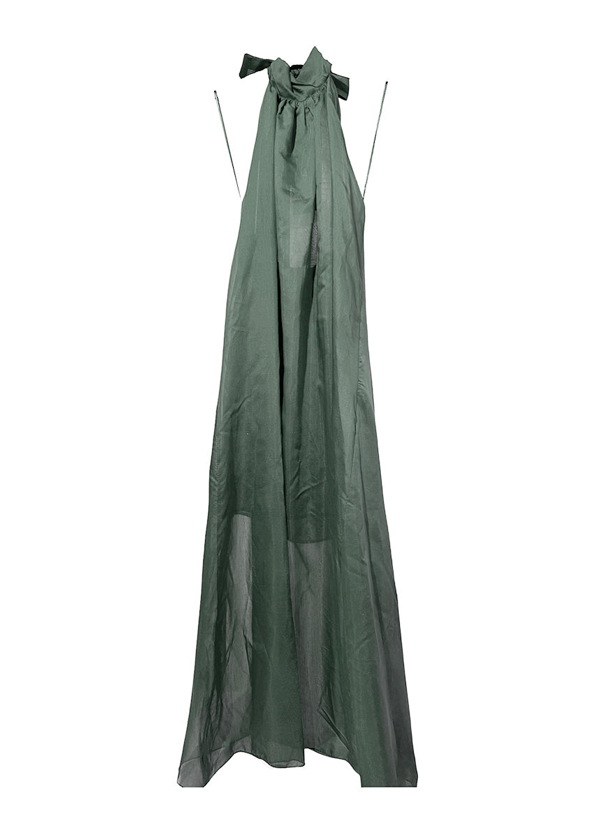 Green dress with sheer overlay on a white background