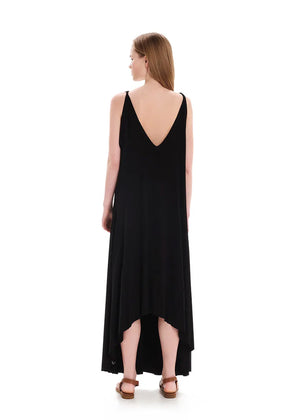 Black asymmetrical sleeveless dress, crafted from eco-friendly elastic EcoVero viscose. Featuring a relaxed fit and a soft, cozy texture. Its unique design includes a V-shaped back, which can be reversed for a boat neckline in front.