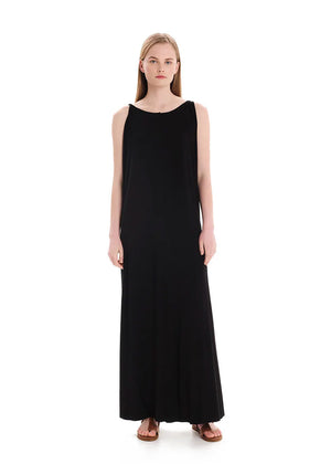 Black asymmetrical sleeveless dress, crafted from eco-friendly elastic EcoVero viscose. Featuring a relaxed fit and a soft, cozy texture. Its unique design includes a V-shaped back, which can be reversed for a boat neckline in front.