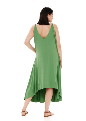 Green asymmetrical sleeveless dress, crafted from eco-friendly elastic EcoVero viscose. Featuring a relaxed fit and a soft, cozy texture. Its unique design includes a V-shaped back, which can be reversed for a boat neckline in front.