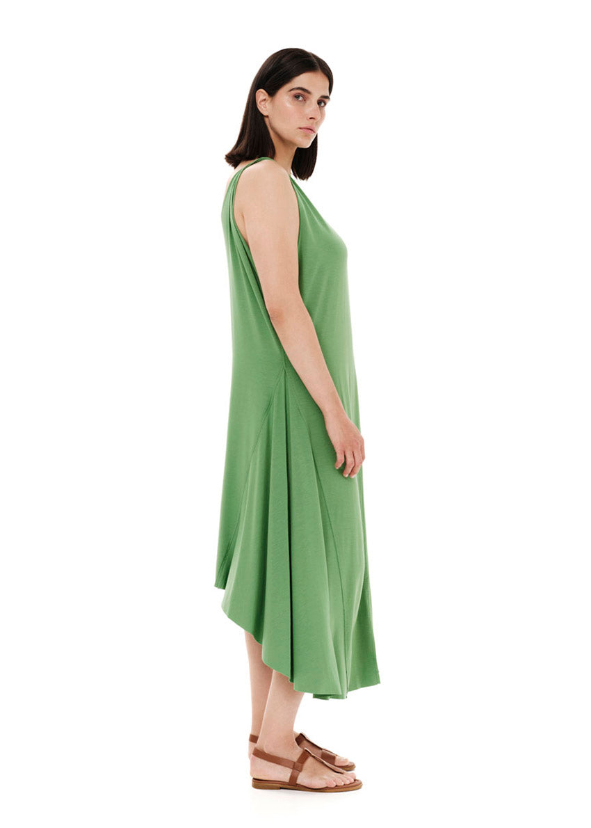 Green asymmetrical sleeveless dress, crafted from eco-friendly elastic EcoVero viscose. Featuring a relaxed fit and a soft, cozy texture. Its unique design includes a V-shaped back, which can be reversed for a boat neckline in front.