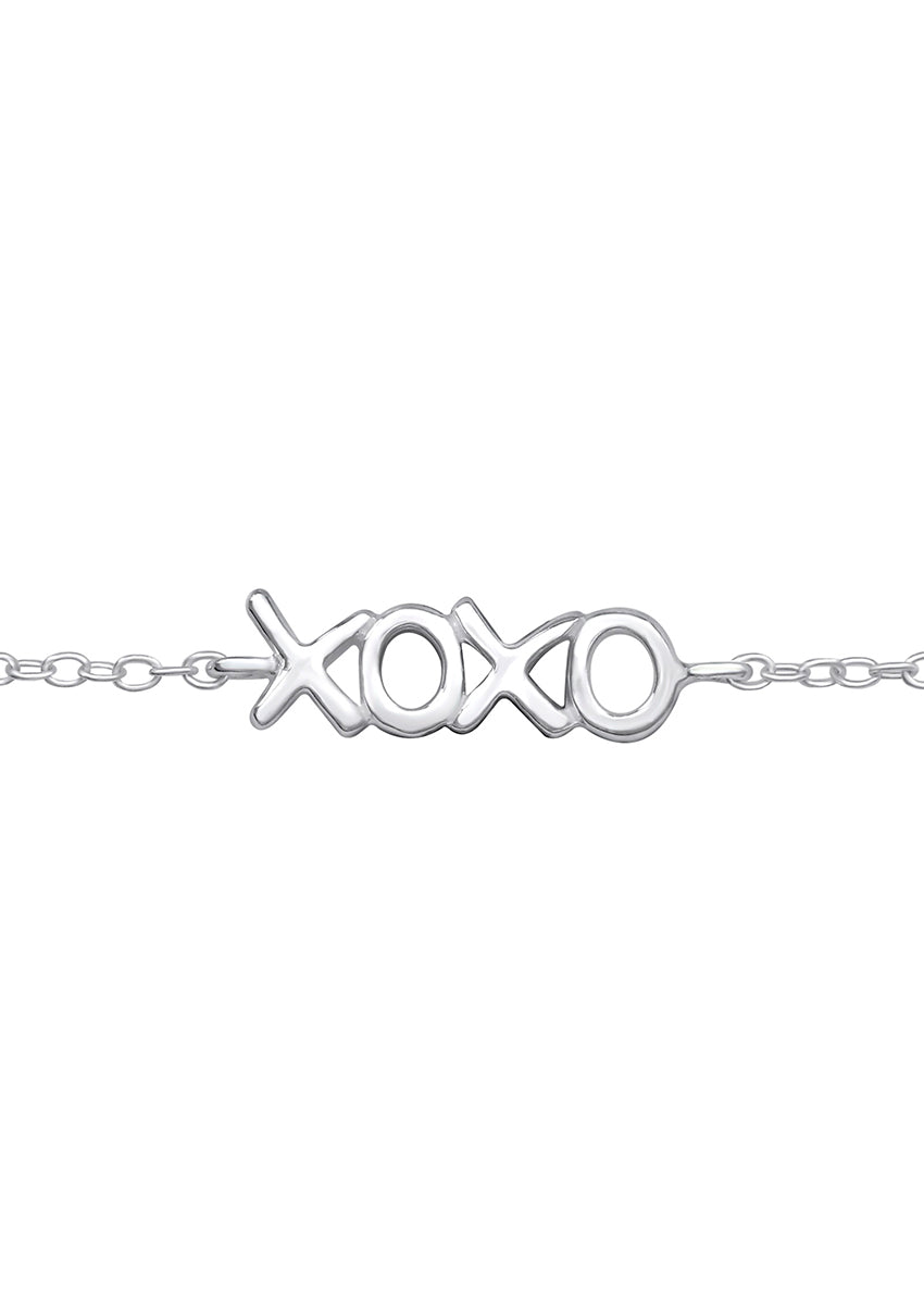 A silver bracelet with the word 'XOXO' in the center, featuring a chain design.