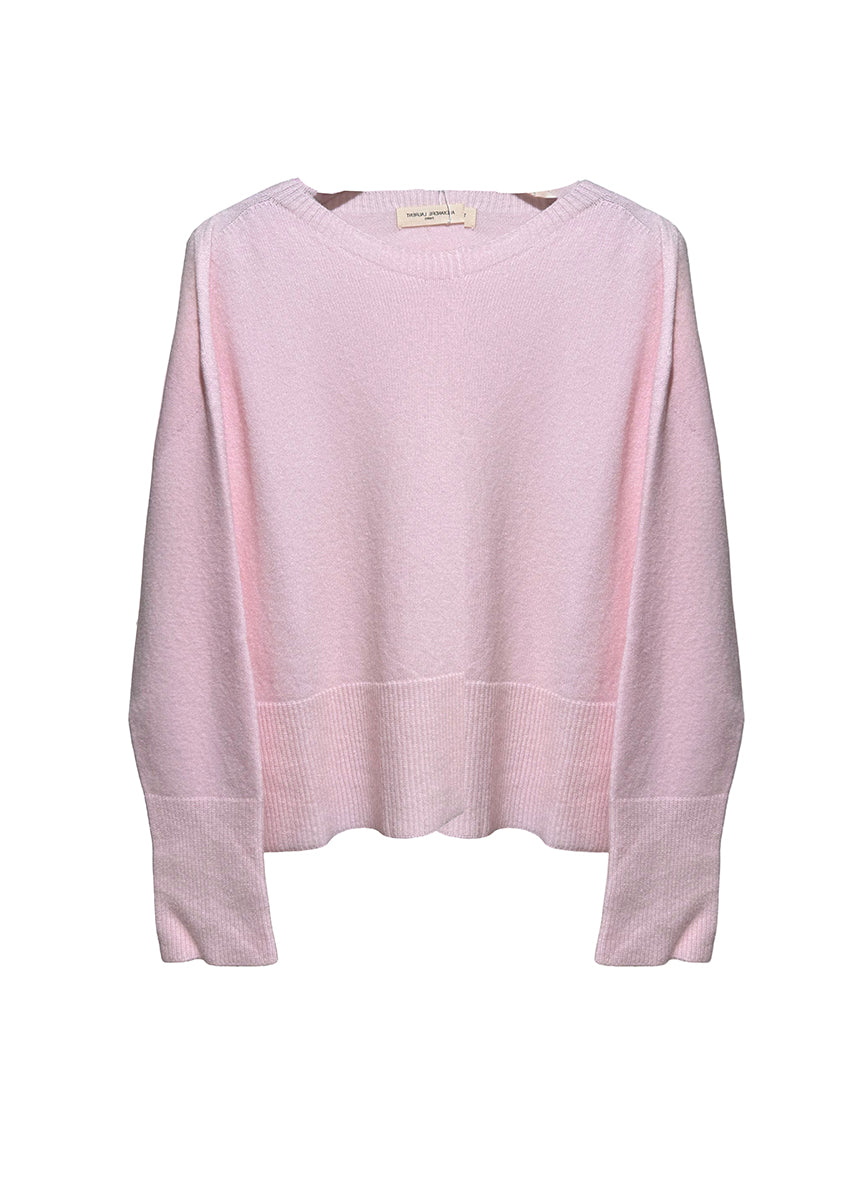 Pink sweater on a white background